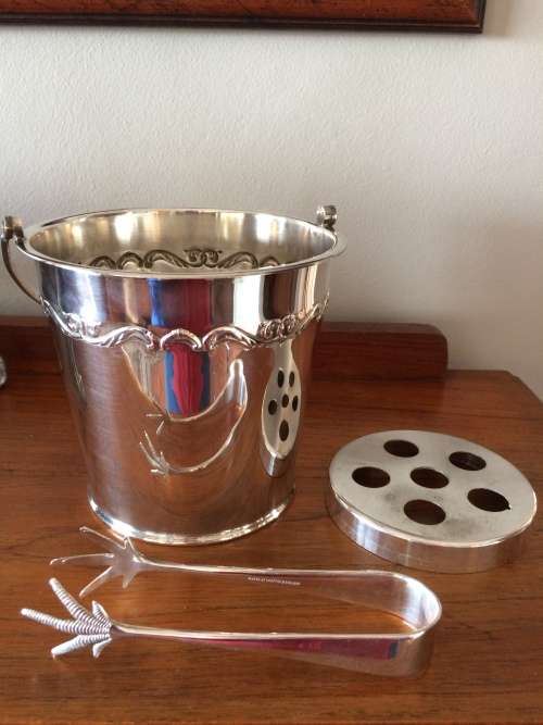 Silverplate ice bucket with strainer and tongs